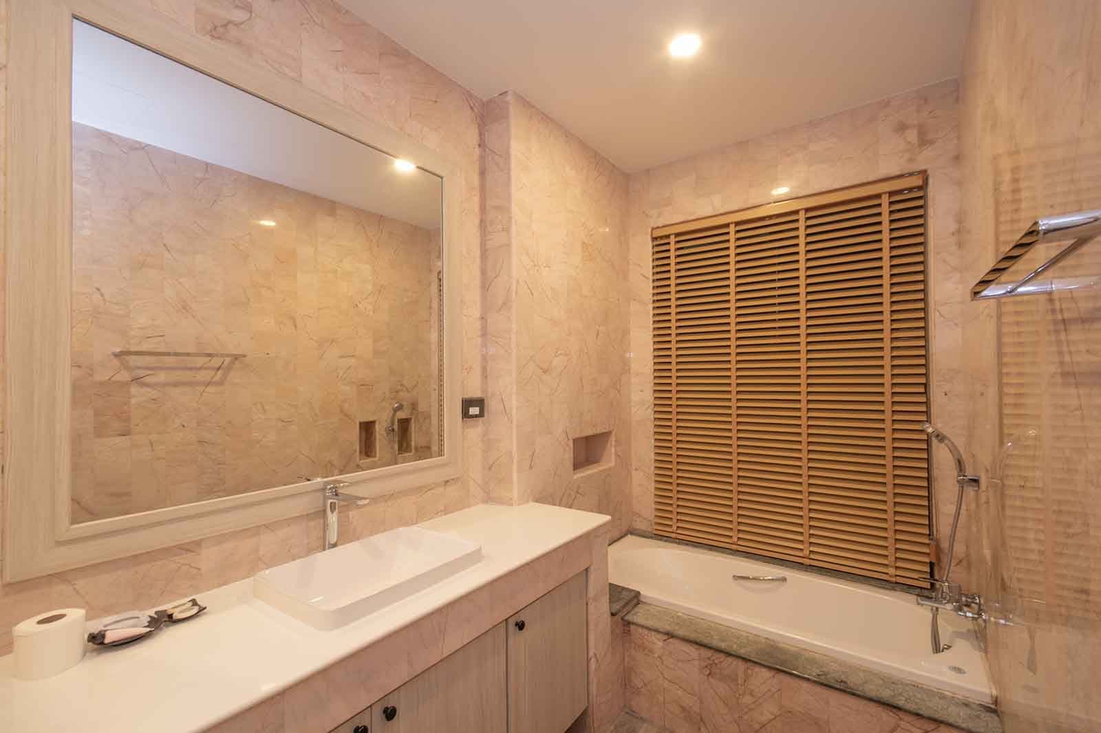 Ensuite bathroom with bath