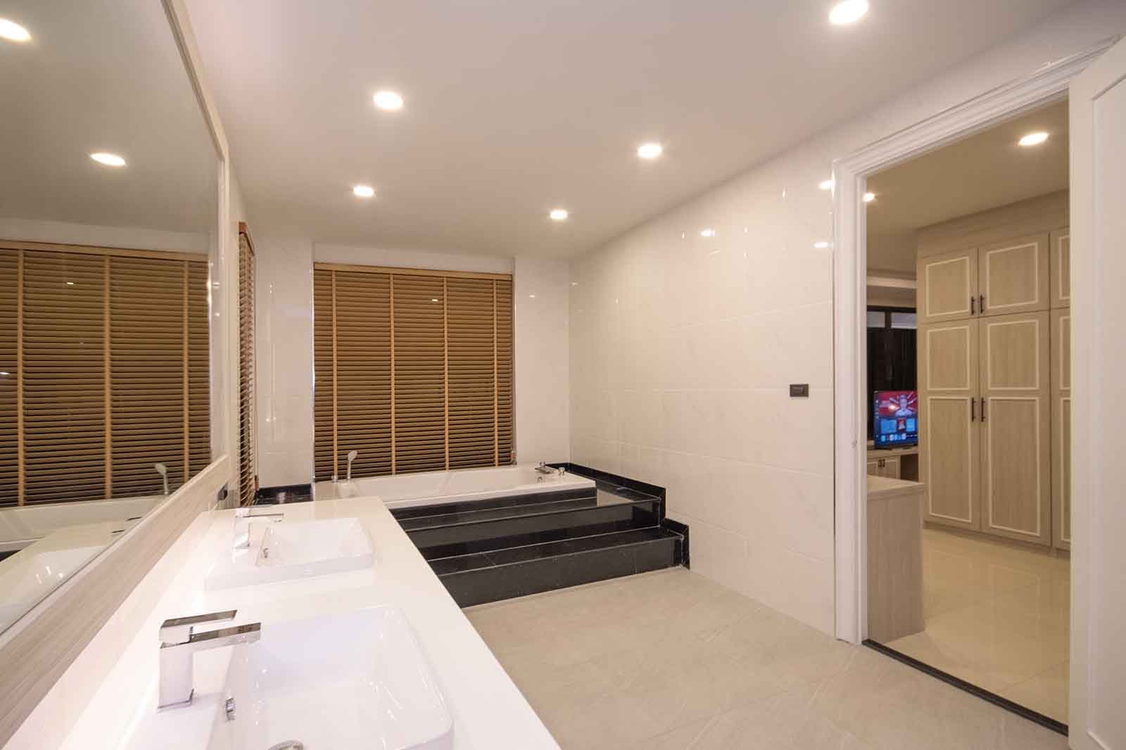 Ensuite bathroom with sunken bath
