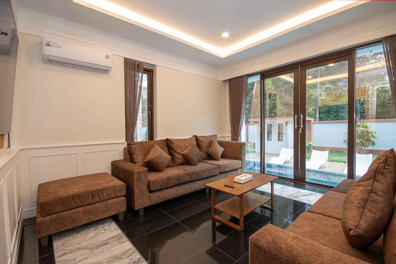 The living room, opening onto the pool
