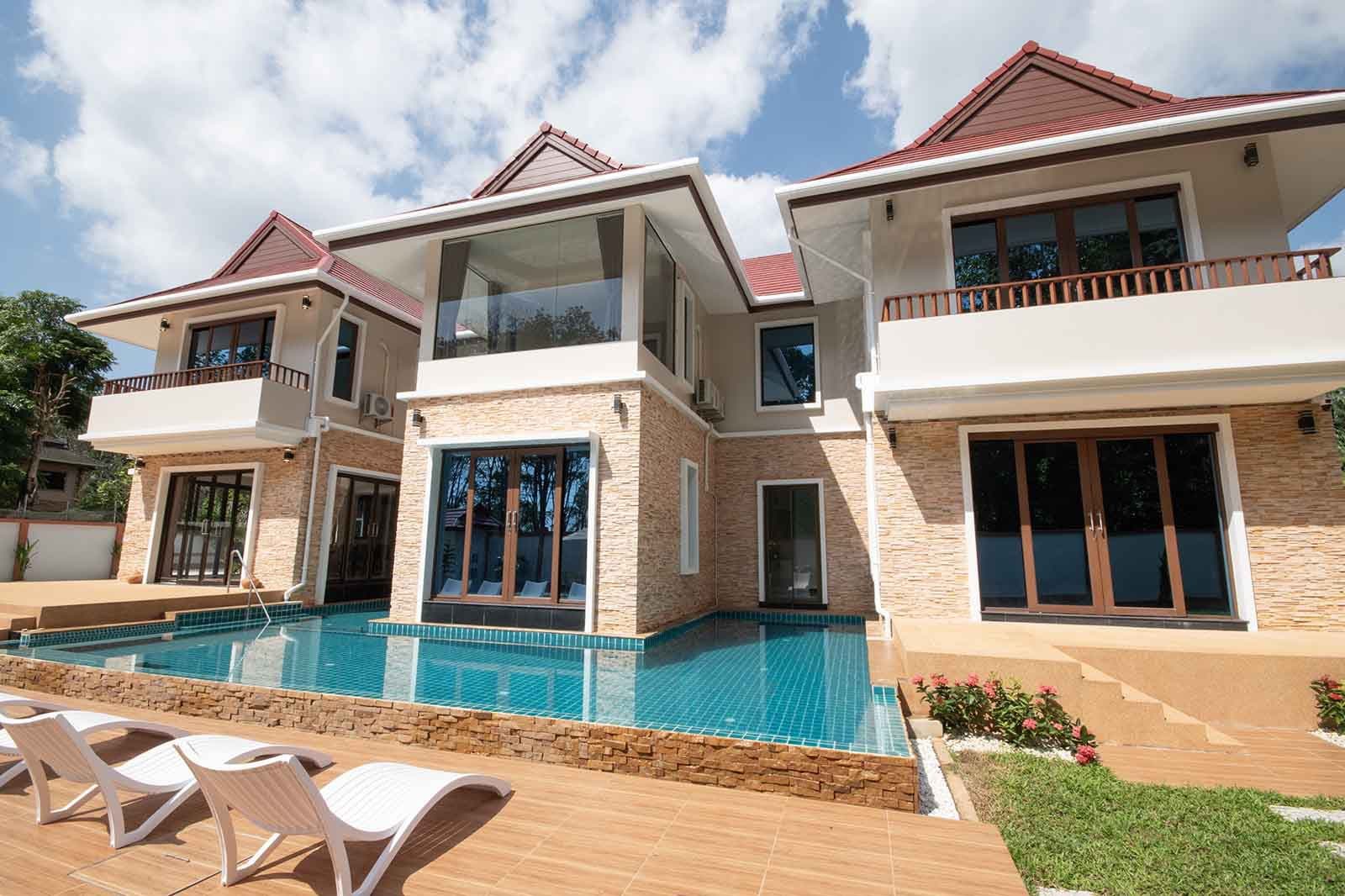 The pool and sun loungers in the afternoon